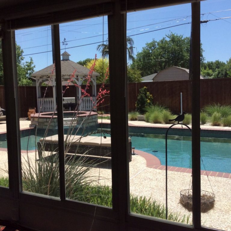 Residential window tinting improves a sunroom in Frisco, TX